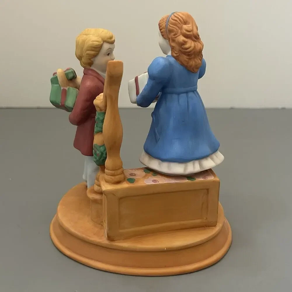 1984 Avon Christmas Memories Series Celebrating Joy Giving Porcelain Figurine